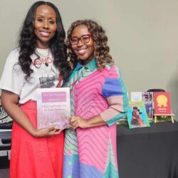 Tierashia Adair at the Anointed Brunch with a customer who purchased her "Life on Purpose Journal."